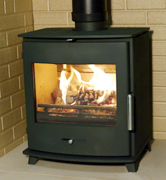 Newbourne Freestanding stove in fireplace with flames_thumb